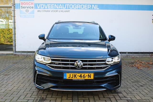 Volkswagen TIGUAN 1.4 TSI eHybrid R-Line Business+ | Incl. 12 maanden Garantie | Panorama dak | Memory stand stoelen | Trekhaak wegklapbaar | Stoel & Stuurverwarming | 360* Camera | Climate controle | Adaptive cruise | Elektrische kofferbakklep | Dodehoek detectie | IQ. Li