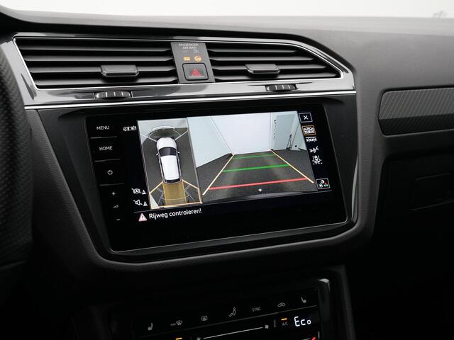 Volkswagen TIGUAN 1.4 TSI eHybrid 245 pk DSG R-Line | Panoramadak | Trekhaak | Navigatie Discover Pro | Leder | Geheugenstoelen | Adaptief onderstel | 360 camera | IQ Light