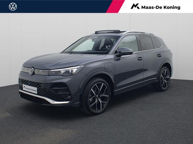 Volkswagen TIGUAN 1.5eHybrid 200kW/272PK R-Line DSG · Panoramadak · Trekhaak · Massagefunctie · Camera · Apple/Android Carplay · Garantie t/m 30-03-2030 of 100000km.
