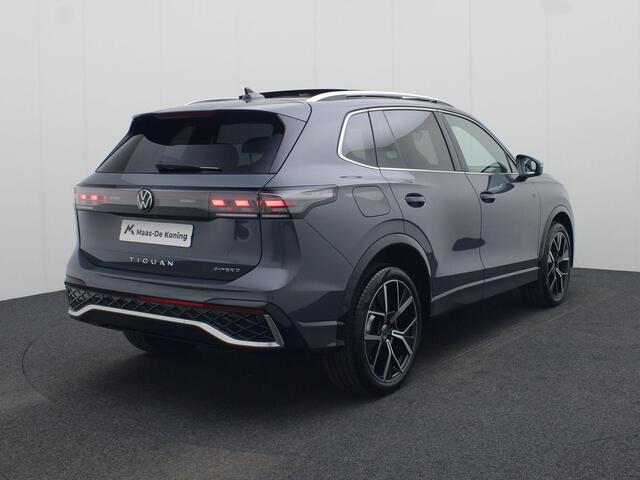 Volkswagen TIGUAN 1.5eHybrid 200kW/272PK R-Line DSG · Panoramadak · Trekhaak · Massagefunctie · Camera · Apple/Android Carplay · Garantie t/m 30-03-2030 of 100000km.
