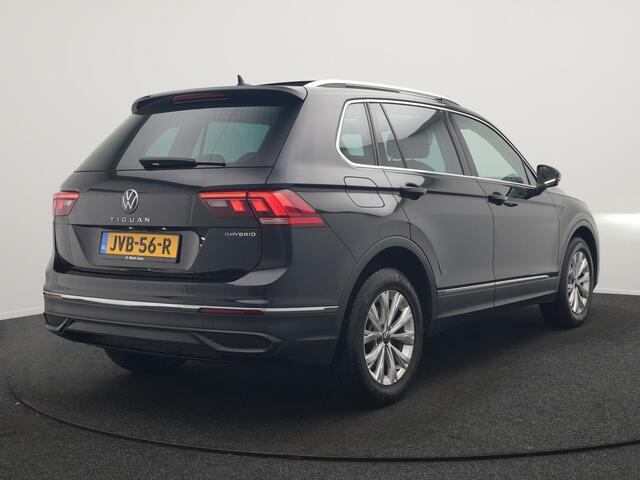 Volkswagen TIGUAN 1.4 TSI eHybrid Elegance Plug In Hybrid 245pk Dealer O.H. PHEV | Trekhaak Af Fabriek | Panodak | Adaptive Cruise | Camera | Stuur Verwarmd | Apple Carplay | Keyless | Blis | Navigatie | DAB |