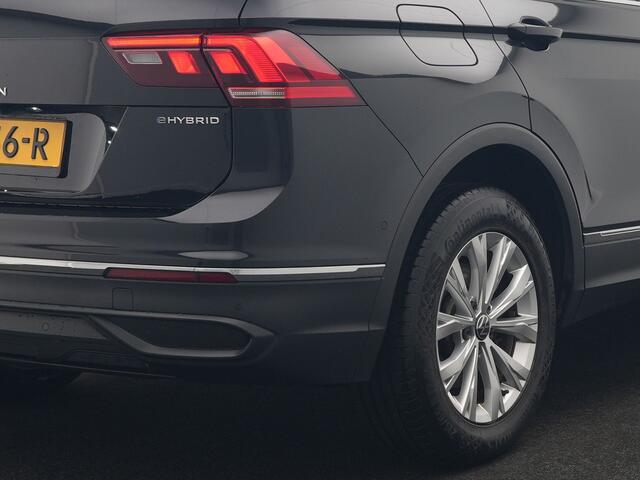 Volkswagen TIGUAN 1.4 TSI eHybrid Elegance Plug In Hybrid 245pk Dealer O.H. PHEV | Trekhaak Af Fabriek | Panodak | Adaptive Cruise | Camera | Stuur Verwarmd | Apple Carplay | Keyless | Blis | Navigatie | DAB |
