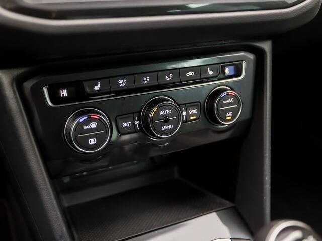 Volkswagen TIGUAN 1.4 TSI Sportline (APPLE CARPLAY, GROOT NAVI, CLIMATE, STOELVERWARMING, ADAPTIVE CRUISE, SPORTSTOELEN, TREKHAAK, PARKEERSENSOREN, NIEUWSTAAT)