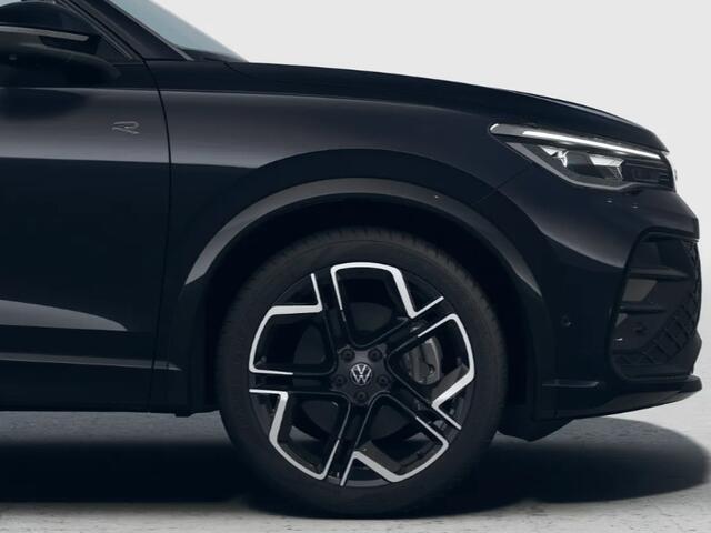 Volkswagen TIGUAN R-Line Edition 1.5 eHybrid 204 PK 6 versn. DSG · Achteruitrijcamera · Draadloze telefoonlader · Black Style Pakket · Trekhaak inklapbaar, met elektrische ontgrendeling, incl. aanhangermanoeuvreerhulp Trailer Assist ·
