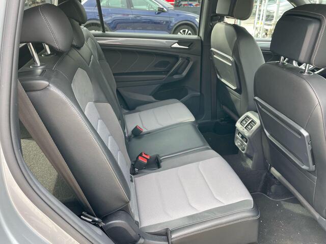 Volkswagen TIGUAN 2.0 TSI 4Motion R-Line 7p 7 zits r-line in en exterieur panoramadak 20" LMV Suzuka head up display discover pro navi digital cockpit pro area view rondom zicht camera verwarmbare voorruit stoelverwarming elektrische achterklep keyless entry wegklapbare tr