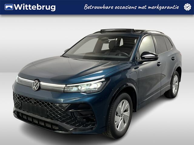 Volkswagen TIGUAN 1.5 eHybrid R-Line / AUTOMAAT/ 272 PK/ GARANTIE TM 06-2030/ PANO/ TREKHAAK/ STOELVENTILATIE/ 360 CAMERA/ DODEHOEK/ ACC/ MEMORY SEAT/ STUUR+STOELVERWARM./ MASSAGE/ HARMAN KARDON/ ELEK.ACHTERKLEP/ APP-CONNECT