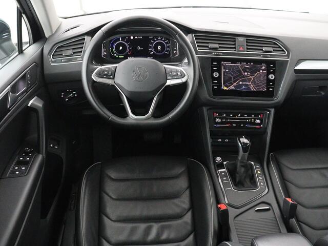 Volkswagen TIGUAN 1.4 TSI eHybrid Elegance Exclusive | SOH 88% | Panoramadak | Leder | Stoelverwarming | 360 Camera | Virtual Cockpit | Adaptive cruise | Carplay | Sfeerverlichting | Navigatie | Matrix LED | PHEV | Plug In
