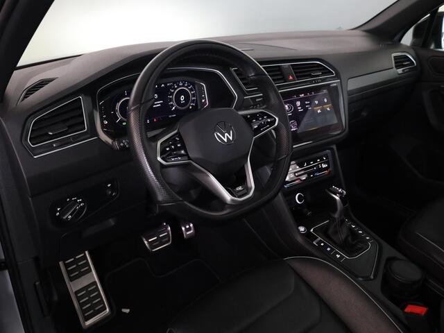 Volkswagen TIGUAN 1.4 TSI eHybrid R-Line Business 245 pk Automaat (DSG) | Navigatie | Panoramadak | Trekhaak (wegklapbaar) | Parkeersensoren (Park assist) | Achteruitrijcamera | Lederen bekleding | Elektr. voorstoelen met geheugen | R-Line |