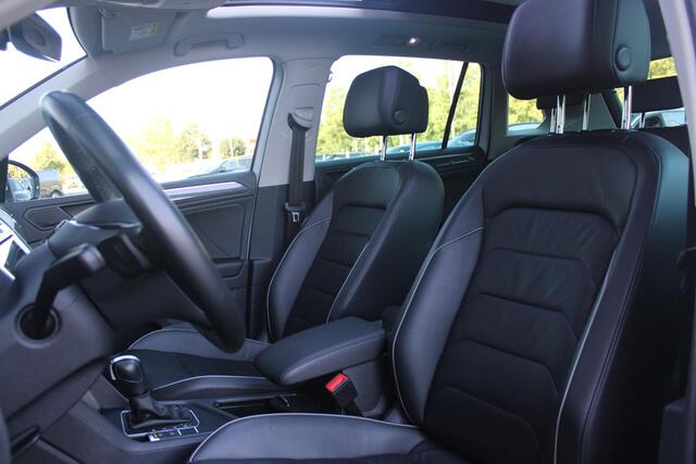 Volkswagen TIGUAN 1.5 TSI 150PK AUTOMAAT HIGHLINE BUSINESS R | PANORAMA SCHUIF/KANTEL DAK | LEDEREN BEKLEDING | BESTUUDERSSTOEL ELEKTRISCH VERSTELBAAR MET GEHEUGENFUNCTIE | ELEKTRISCH WEGKLAPBARE TREKHAAK | IQ LIGHT KOPLAMPEN | VIRTUAL DISPLAY | DRAADLOZE APPLE CARPLAY/ANDROID AUTO | NAVIGATIE | 19" LICHTMETALEN VELGEN | ELEKTRISCH BEDIENBARE ACHTERKLEP | GETINTE ACHTERRUITEN | CAMERA VOOR + ACHTER | PARKEERSENSOREN VOOR + ACHTER | STOEL VERWARMING |