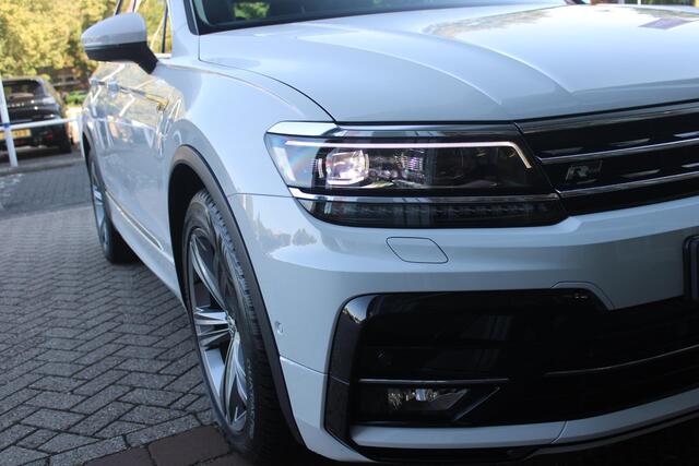 Volkswagen TIGUAN 1.5 TSI 150PK AUTOMAAT HIGHLINE BUSINESS R | PANORAMA SCHUIF/KANTEL DAK | LEDEREN BEKLEDING | BESTUUDERSSTOEL ELEKTRISCH VERSTELBAAR MET GEHEUGENFUNCTIE | ELEKTRISCH WEGKLAPBARE TREKHAAK | IQ LIGHT KOPLAMPEN | VIRTUAL DISPLAY | DRAADLOZE APPLE CARPLAY/ANDROID AUTO | NAVIGATIE | 19" LICHTMETALEN VELGEN | ELEKTRISCH BEDIENBARE ACHTERKLEP | GETINTE ACHTERRUITEN | CAMERA VOOR + ACHTER | PARKEERSENSOREN VOOR + ACHTER | STOEL VERWARMING |