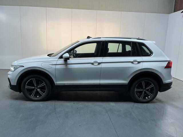 Volkswagen TIGUAN 1.4 TSI eHybrid Elegance / AUTOMAAT/ PANO/ TREKHAAK/ PARK.SENSOR.V+A/ CAMERA/ STUUR+STOELVERWARM./ APP-CONNECT/ ACC/ ELEK.ACHTERKLEP/ DIGITAL DASH/ NAVI/ DAB/ CLIMA/ IQ.LIGHT