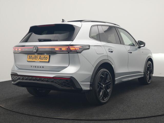 Volkswagen TIGUAN 1.5 eHybrid R-Line Edition PHEV 272pk | Trekhaak Af Fabriek | Panodak | Head Up | Adaptive Cruise | Lederen Sportstoelen Massage & Ventilatie & Memory | 360 Camera | IQ Light | Harman / Kardon | Stuur Verwarmd | Keyless | Blis | Plug In Hybrid |