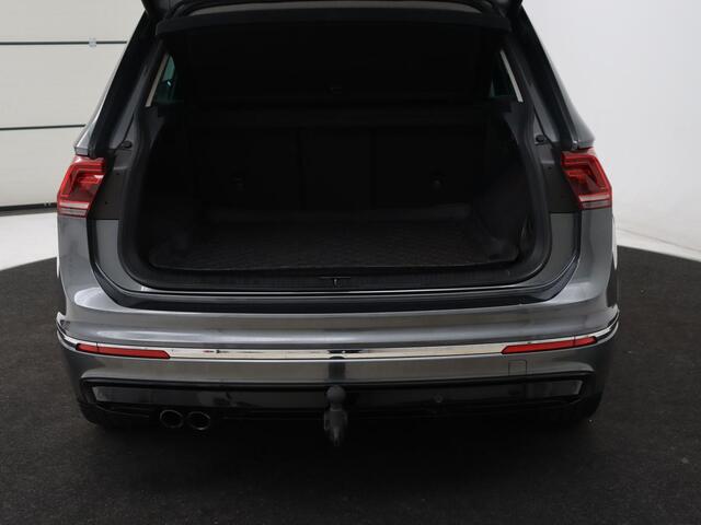 Volkswagen TIGUAN 1.4 TSI R Line | Panoramadak | Stoelverwarming | Trekhaak | Adaptive cruise | Virtual Cockpit | Dynaudio | Massage | Camera | Navigatie | LED Plus | Keyless | 20'' | Park Assist
