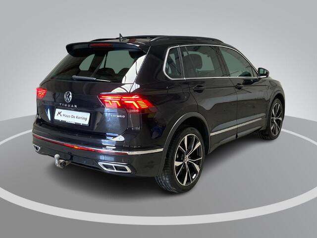 Volkswagen TIGUAN 1.4TSIeHybrid 180kW/245PK DSG R-Line · Panoramadak · Trekhaak · 360°Camera + Parkeersensoren · 20'' · Apple/Android Car Play ·