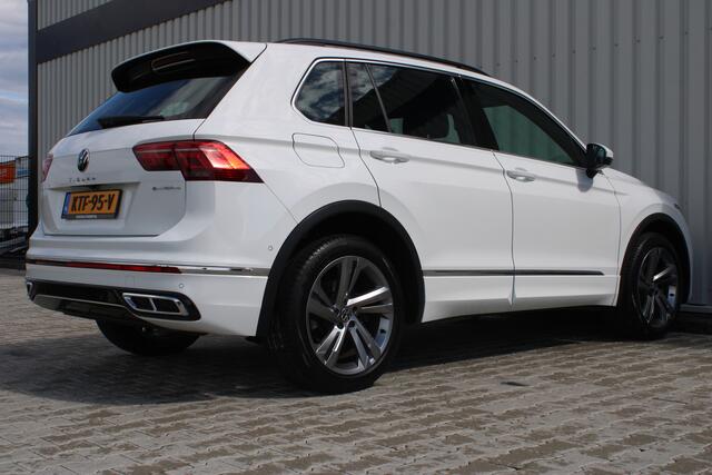 Volkswagen TIGUAN 1.4 TSI eHybrid R-Line Business+ | Incl. 12 maanden garantie | SOH 92% | Stoel/stuurverwarming | Parkeercamera | Wegklapbare trekhaak | DAB radio | Apple carplay/Android auto | 100% dealer onderhouden |