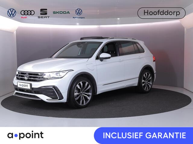 Volkswagen TIGUAN 1.4 TSI eHybrid R-Line Business 245 pk Automaat (DSG) | Navigatie | Panoramadak | Park assist | Rondomzicht camera | Head-up display | Lederen bekleding | Elektr. voorstoelen met geheugen | R-Line |