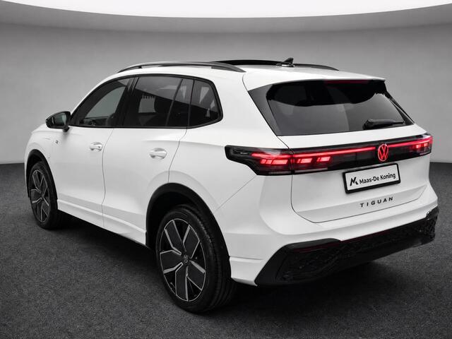 Volkswagen TIGUAN 1.5eHybrid 150kW/204PK R-Line Black Style · Leder · Trekhaak · Panoramadak · 360°Camera · Garantie t/m 28-10-2030 of 100000km.