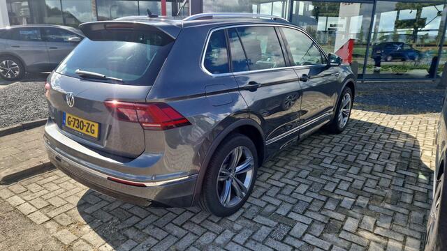 Volkswagen TIGUAN 1.5 TSI ACT Highline 110KW/150Pk DSG, R Line, lederen bekleding met elektrische stoelverstelling en geheugen, achteruitrijcamera, trekhaak wegklapbaar, digital cockpit pro, park assist, spiegel pakket, door ons geleverd en onderhouden, 19" Sebring, LED koplampen