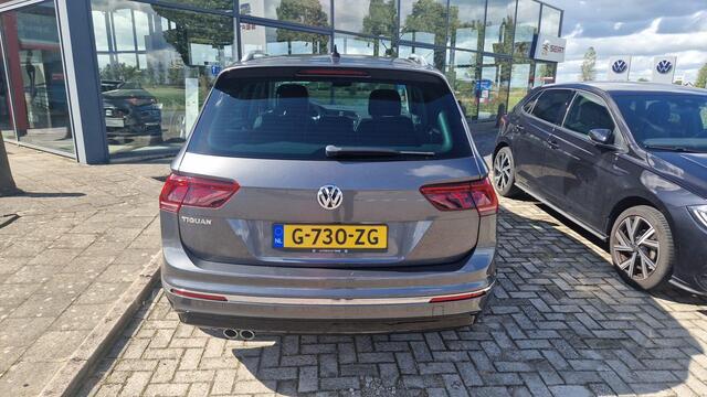 Volkswagen TIGUAN 1.5 TSI ACT Highline 110KW/150Pk DSG, R Line, lederen bekleding met elektrische stoelverstelling en geheugen, achteruitrijcamera, trekhaak wegklapbaar, digital cockpit pro, park assist, spiegel pakket, door ons geleverd en onderhouden, 19" Sebring, LED koplampen