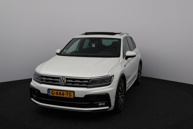 Volkswagen TIGUAN 1.5 TSI ACT R-Line/ Elek. Trekhaak/ Panorama-Dak/ 20'' LMV/ LED koplampen/ Zwarte-Hemel/ Adaptive Cruise/ Stoelverw./ Alcantara/ Virtual Cockpit/ Apple + Android/ DAB+/ Navi/ Lane-Assist./ Extra getint glas/ Ext