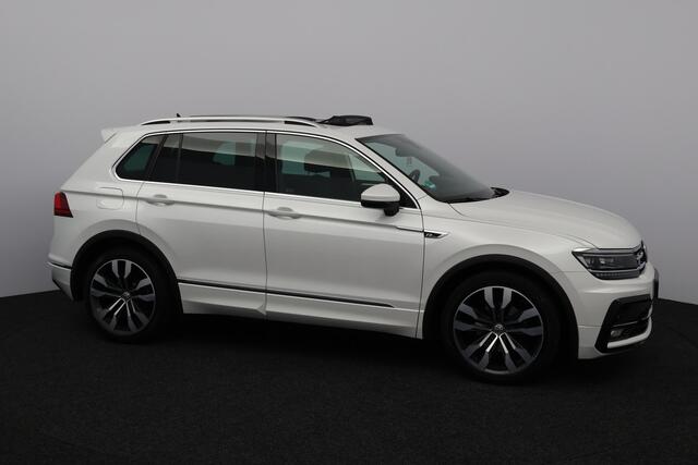 Volkswagen TIGUAN 1.5 TSI ACT R-Line/ Elek. Trekhaak/ Panorama-Dak/ 20'' LMV/ LED koplampen/ Zwarte-Hemel/ Adaptive Cruise/ Stoelverw./ Alcantara/ Virtual Cockpit/ Apple + Android/ DAB+/ Navi/ Lane-Assist./ Extra getint glas/ Ext