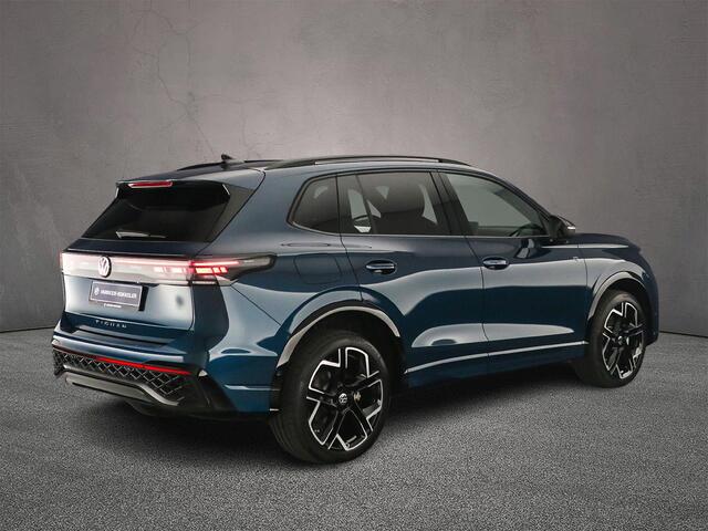 Volkswagen TIGUAN 1.5 eHybrid R-Line Edition 272pk DSG Automaat, Trekhaak, Panoramadak, Lederen bekleding, Harman Kardon, 360 camera, Adaptive cruise control, Dodehoeksensoren, Matrix LED koplampen, App-connect, Navigatie, Elektrische achterklep