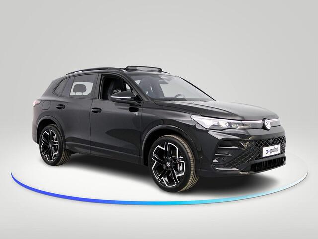 Volkswagen TIGUAN 1.5 eHybrid R-Line Edition 272 pk Automaat (DSG) | Verlengde garantie | Navigatie | Panorama dak | Trekhaak (wegklapbaar) | Achteruitrijcamera (park assist) | Rondomzicht camera | Black-Style pakket | R-Line |
