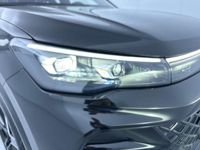 Volkswagen TIGUAN 1.5 eHybrid R-Line Edition 272 pk Automaat (DSG) | Verlengde garantie | Navigatie | Panorama dak | Trekhaak (wegklapbaar) | Achteruitrijcamera (park assist) | Rondomzicht camera | Black-Style pakket | R-Line |