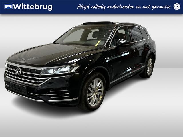 Volkswagen TOUAREG 3.0 TSi eHybrid 4MOTION Elegance / AUTOMAAT/ 381PK/ PANO/ ELEKTR. TREKHAAK/ LEER/ 21" LMV/ LUCHTVERING/ 4-ZONE CLIMA/ ELEKTR. STOELEN/ APP-CONNECT/ NAVI/ ADAPT. CRUISE/ STOEL VERWARM V+A/ STOEL VENTILATIE/ CAMERA