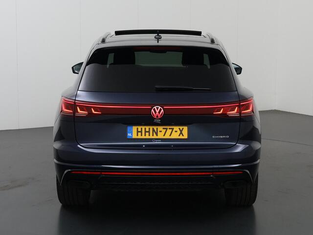 Volkswagen TOUAREG 3.0 TSi eHybrid 4MOTION R | HUD | Dyna Audio | Trekhaak | Nachtzicht | Stoelverwarming voor en achter | Panoramadak | Matrix LED | Luchtvering | Stoelmassage | Comfort-Pakket | SoftClose |