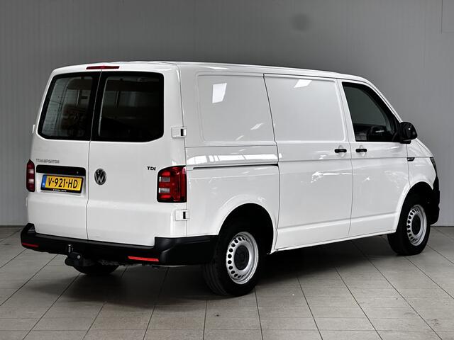 Volkswagen TRANSPORTER 2.0 TDI L1H1/ Dealer onderhouden!/ Trekhaak/ Zij-Schuifdeur Rechts/ Bluetooth/ Airco/ Cruise/ Elek. pakket/ Armsteun/ AUX & USB/ Dagrijverl.