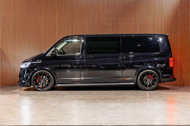 Volkswagen TRANSPORTER 2.0 TDI L2H1 DC Caravelle | LeightonVans Bodykit | ACC | Bi-Xenon | Elek deuren | Lederen bekleding | Camera | CarPlay | Navigatie | Trekhaak | Nieuwe APK