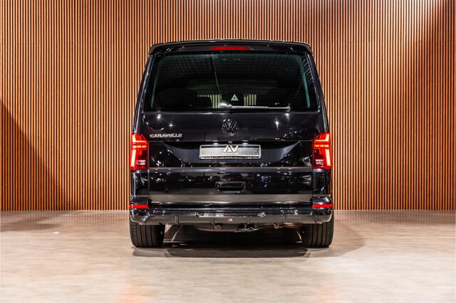Volkswagen TRANSPORTER 2.0 TDI L2H1 DC Caravelle | LeightonVans Bodykit | ACC | Bi-Xenon | Elek deuren | Lederen bekleding | Camera | CarPlay | Navigatie | Trekhaak | Nieuwe APK