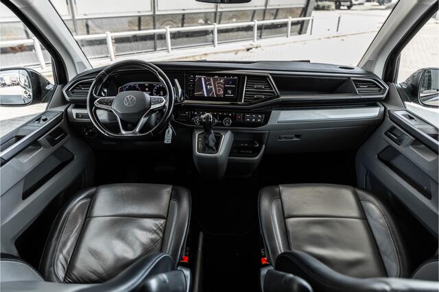 Volkswagen TRANSPORTER 2.0 TDI L2H1 DC Caravelle | LeightonVans Bodykit | ACC | Bi-Xenon | Elek deuren | Lederen bekleding | Camera | CarPlay | Navigatie | Trekhaak | Nieuwe APK
