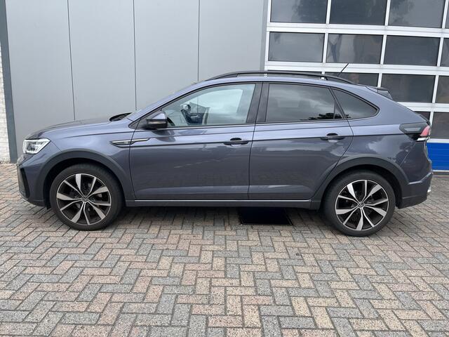 Volkswagen Taigo 1.5 TSI R-Line / AUTOMAAT/ 2X R-LINE/ 150 PK/ ADAPTIVE CRUISE/ PARK.SENSOREN V+A/ CAMERA/ APP-CONNECT/ STOELVERWARM./ KEYLESS/ DIGITAL DASH/ DAB/ NAVI/ CLIMA/ LED/ IQ.LIGHT/ 18'' LMV