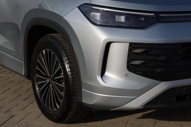 Volkswagen Tayron 1.5 eHybrid Life Edition 150KW/204PK, Snelladen 40KW mogelijk, 60 mnd 100.000km garantie, 18" LMV All season, wegklapbare trekhaak, stoelverwarming, DCC, adaptief onderstel, privacy glas, chrome dakrail, camera, side assist, ACC 3 zone climatronic, park a