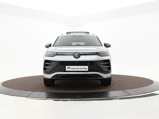 Volkswagen Tayron 1.5 eHybrid 272pk DSG R-Line Edition · Panoramadak · Inklap. Trekhaak · 360 Camera · Matrix LED · Stuur- & Stoelverwarming · Keyless · Garantie t/m 03-11-2029 of 100.000km