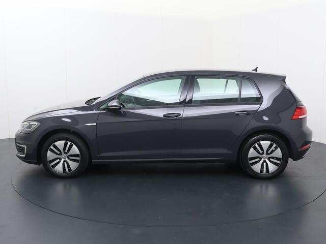 Volkswagen e-Golf E-DITION | Automaat | Multifunctioneel stuurwiel | Adaptive cruise control | ACC | Frontassist | Spraakbediening | Automatische verlichting | Spiegelverwarming | Bluetooth | Navigatie FullMap | Apple Carplay - Androidauto | Climate | Parkeersensoren voor
