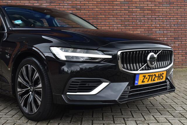 Volvo S60 T6 Recharge 350PK AWD Ultimate Bright | Bowers en Wilkins | Trekhaak | Rondomzicht camera | Massage functie voorstoelen