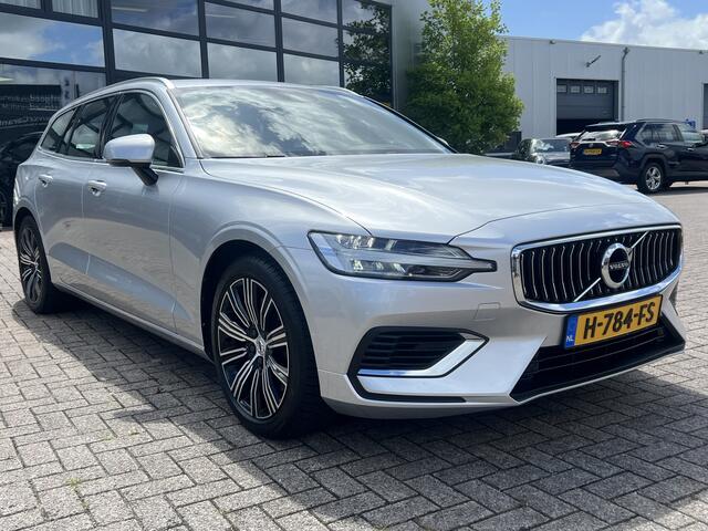 Volvo V60 2.0 T6 340 pk Twin Engine AWD Inscription Navigatie Sportstoelen Stoelverwarming Camera Elek. Bestuurderstoel Leder Trekhaak Dab Carplay NL Auto 1e Eigenaar Plug in Hybride BTW Auto