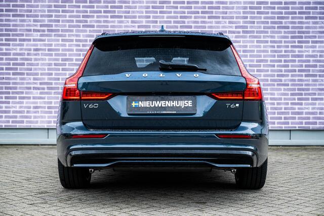 Volvo V60 2.0 T6 Plug-in hybrid AWD Ultra Dark | Schuif-/kanteldak | Head Up Display | Donker Glas | Sportstoelen | Power Seats | Harman Kardon |