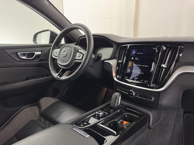 Volvo V60 2.0 T8 Recharge AWD R-Design Black-Line {SoH-99%} (Plug-in) (INCL-BTW) Aut. *LEATHER-FABRIC | FULL-LED | MEMORY-PACK | HARMAN/KARDON | DIGI-COCKPIT | HEATED-SPORTSEATS | KEYLESS | DAB+ | NAVI-FULLMAP | PDC | CRUISE | HEAD-UP | TOWBAR | 19''