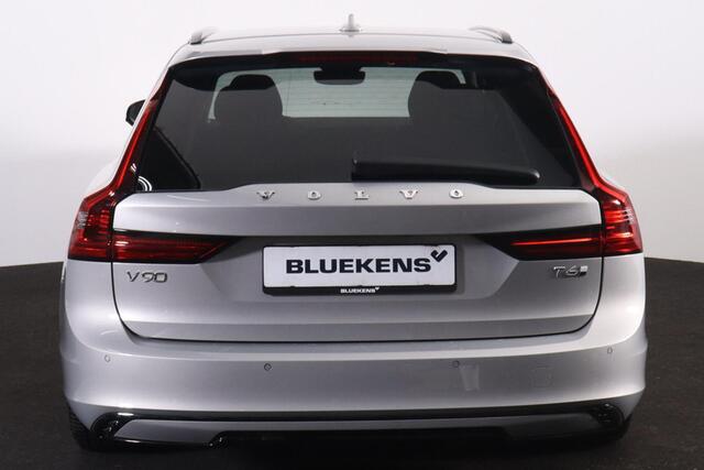 Volvo V90 T6 Recharge AWD Plus Dark - IntelliSafe Assist & Surround - 360º Camera - Harman/Kardon audio - Adaptieve LED koplampen - Verwarmde voorstoelen, stuur & achterbank - Parkeersensoren voor & achter - Elektr. bedienb. voorstoelen met geheugen - Extra getint