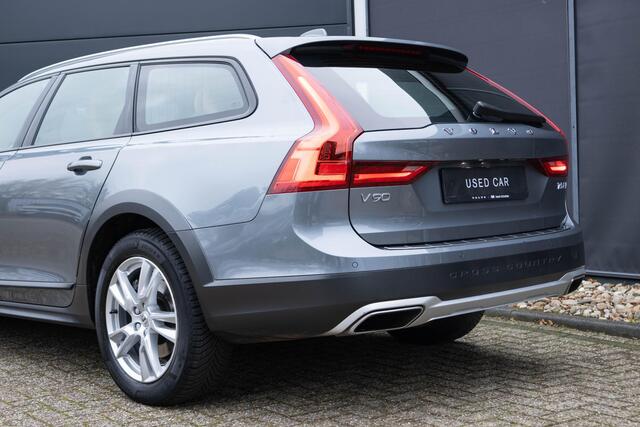 Volvo V90 Cross Country 2.0 T5 AWD Panoramisch schuif-kantel dak | Polestar Engineered Optimalisatie | Klasse III Alarm | Verwarmbare voorstoelen | Parkeerverwarming | Achterbank en Stuurwiel verwarming | Grafisch Head-Up-Display | Parkeer Camera |