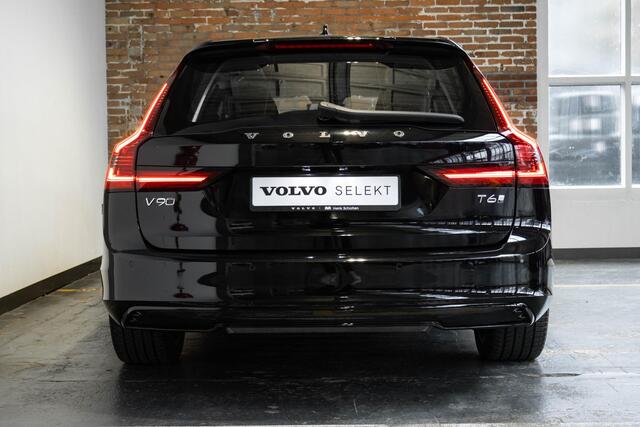 Volvo V90 T6 Automaat Plug-in hybrid AWD Ultra Dark | Panoramadak | Semi elektrische wegklapbare trekhaak | Premium audio by Harman Kardon | 360° parkeercamera | Verwarmbare voorstoelen, achterbank en stuurwiel | Gelamineerde zijruiten | Head-up display |