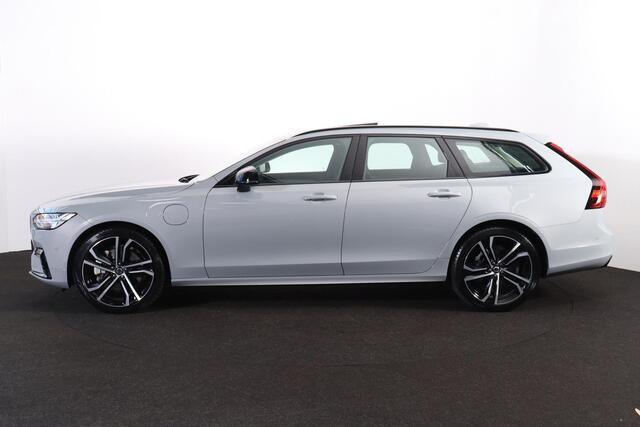 Volvo V90 T8 Recharge AWD Ultra Dark - Luchtvering - Panorama/schuifdak - IntelliSafe Assist & Surround - 360º Camera - Bowers & Wilkins audio - Adaptieve LED koplampen - Verwarmde voorstoelen, stuur & achterbank - Parkeersensoren voor & achter - Elektr. bedienb. v