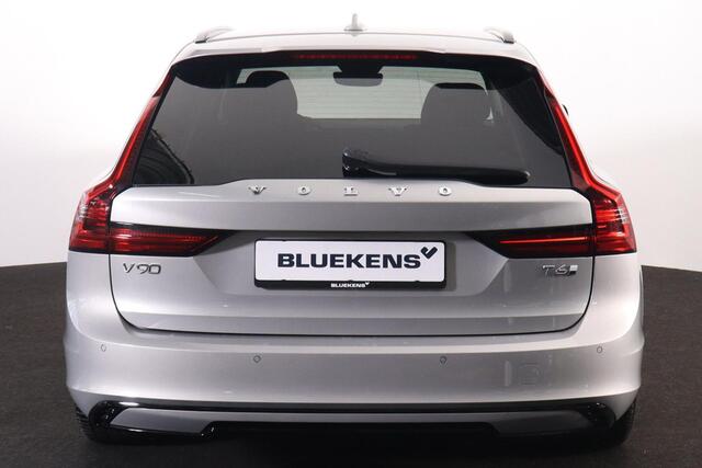 Volvo V90 T6 Recharge AWD Plus Dark - IntelliSafe Assist & Surround - 360º Camera - Harman/Kardon audio - Verwarmde voorstoelen, stuur & achterbank - Parkeersensoren voor & achter - Elektr. bedienb. voorstoelen met geheugen - Extra getint glas - 19' LMV
