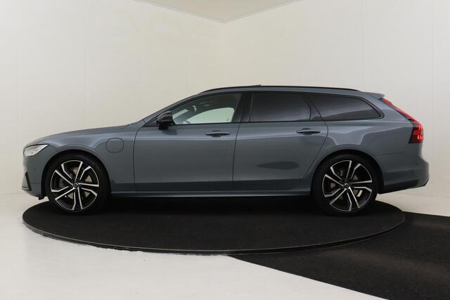 Volvo V90 T6 RECHARGE AWD R-DESIGN -PANO.DAK|HARMAN/KARDON|BLIS|360°CAM|HEAD-UP DISP.|LUCHTVERING|GEVENT.LEDER|STANDKACHEL|ADAP.LED|ADAP.CRUISE|TREKHAAK|20"|SoH:89%