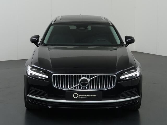 Volvo V90 2.0 T6 Plug-in hybrid AWD Plus Bright | Panoramadak | Trekhaak | Full Led Koplapen| Camera | Verwarmde achterbank | Apple CarPlay/Android Auto | Harman/Kardon Audio | Comfortstoelen | Adaptieve Cruise Control | DAB | Ele. verstelbare stoelen + Geheugen | 