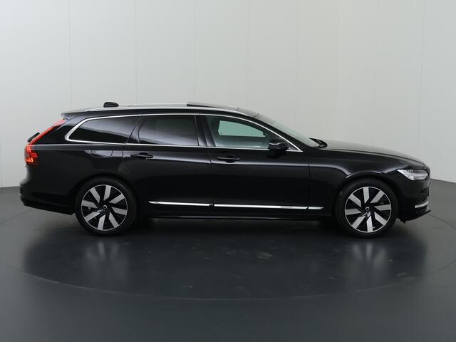 Volvo V90 2.0 T6 Plug-in hybrid AWD Plus Bright | Panoramadak | Trekhaak | Full Led Koplapen| Camera | Verwarmde achterbank | Apple CarPlay/Android Auto | Harman/Kardon Audio | Comfortstoelen | Adaptieve Cruise Control | DAB | Ele. verstelbare stoelen + Geheugen | 